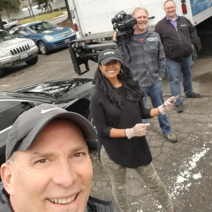 Community volunteers during COVID—service, love, leadership Larry Snyder and volunteers partnering with Kim Peterson during COVID-19, gathering supplies to support local and global communities with love and leadership.