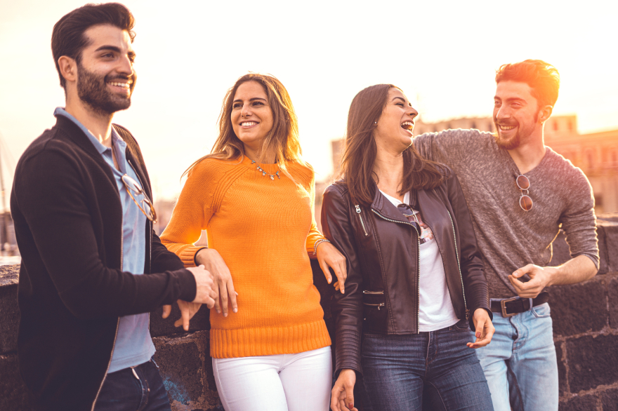 Confident, stylish clients laughing—authentic personal styling and wardrobe consulting results with Kim Peterson.