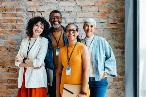Diverse group of confident leaders standing together, symbolizing belonging, authenticity, and purpose-driven leadership