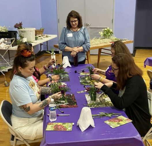 Community members crafting at a table