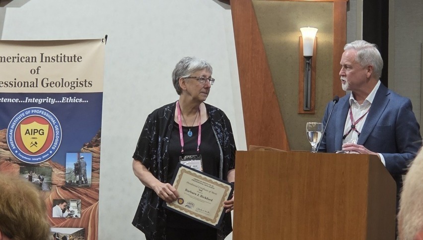 Barb receives an award from AIPG president Chuck Drake