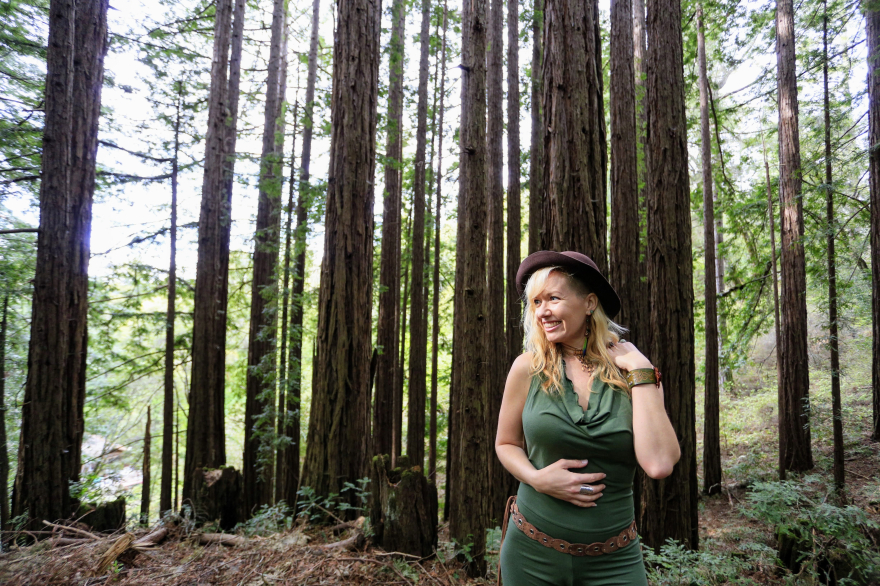 Jessica Ruby standing in a redwood forest