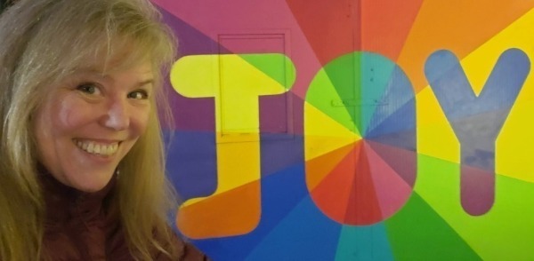 Colleen with Joy sign Colleen with Joy sign